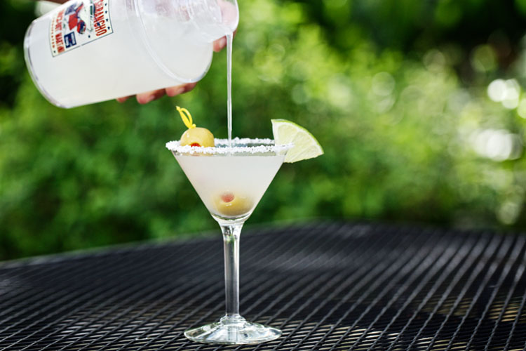 Someone pouring a Matt's Margarita